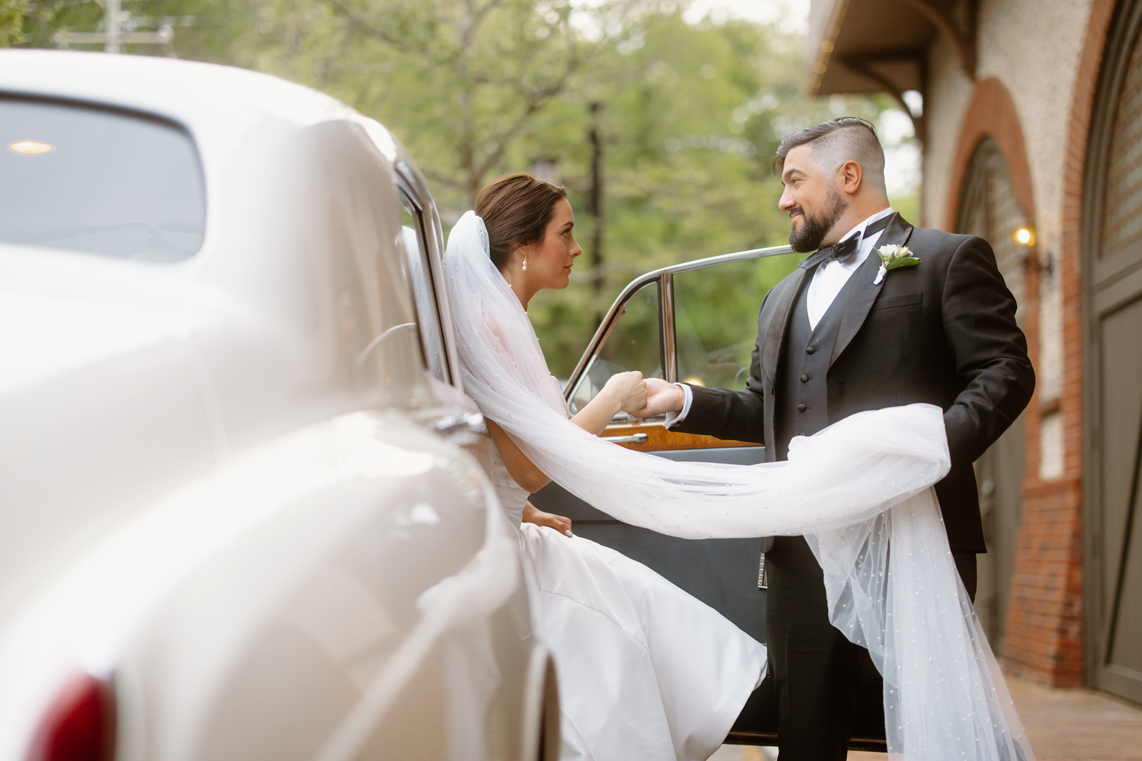 Bride and groom with Rolls-Royce Silver Cloud Anne, courtesy Nathan Rivers Chesky