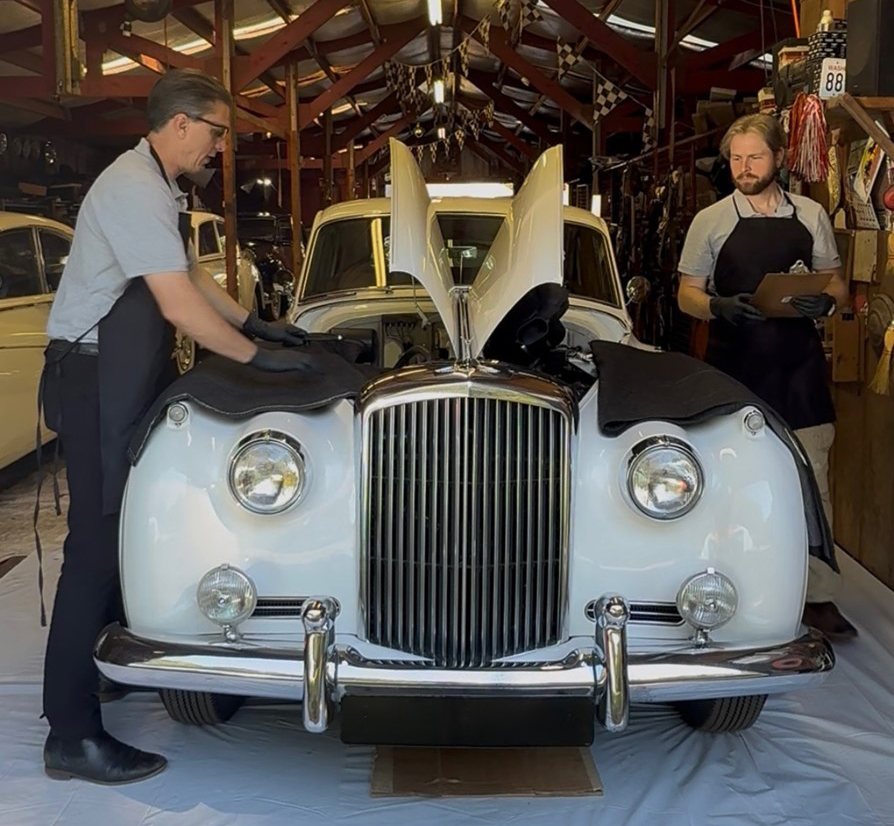 Technician working on a Rolls-Royce in Coats Classic Cars’ in-house restoration shop